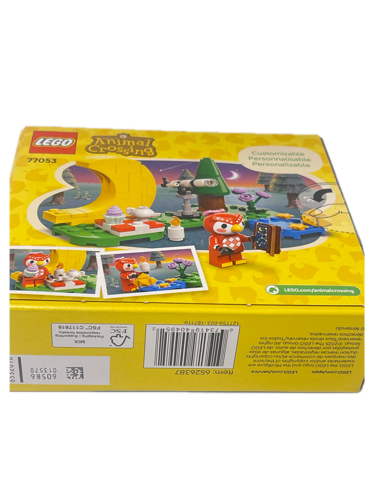 The back of a yellow LEGO toy box, showing product details, instructions, a barcode, and colorful illustrations of a building set on a white background.