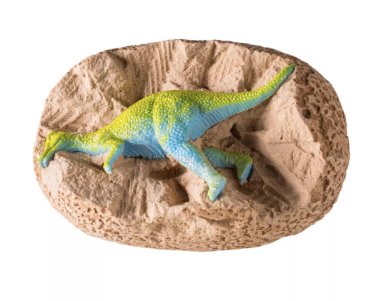 Toy dinosaur on a rock-like surface