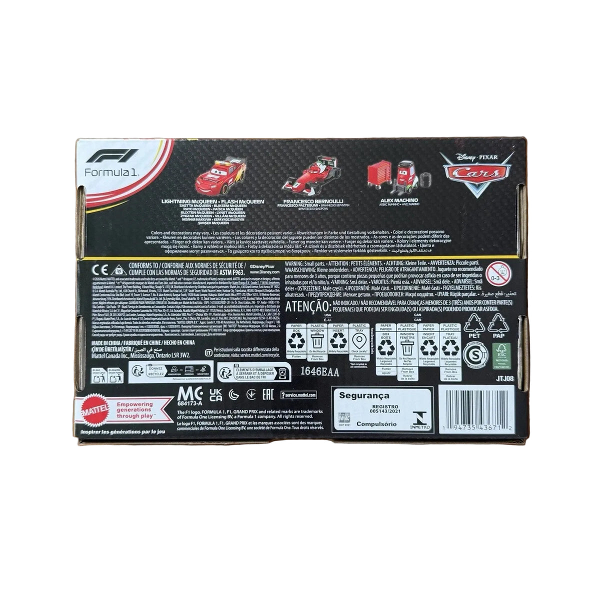 The back of a Disney Pixar Cars Formula 1 toy box, showing product information, warnings, and branding in Portuguese, placed on a wooden table.