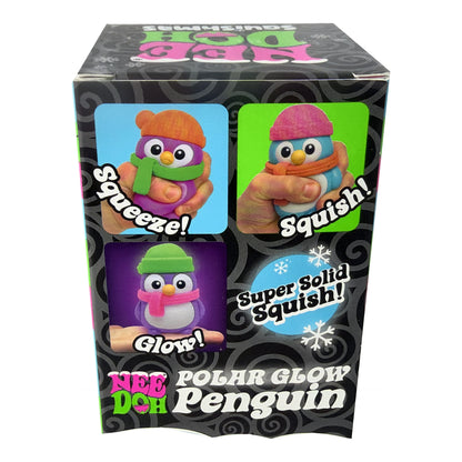 Nee Doh Polar Glow Penguin toy packaging box, featuring three panels showing the penguin being squeezed, squished, and glowing, with product text on a black patterned background.