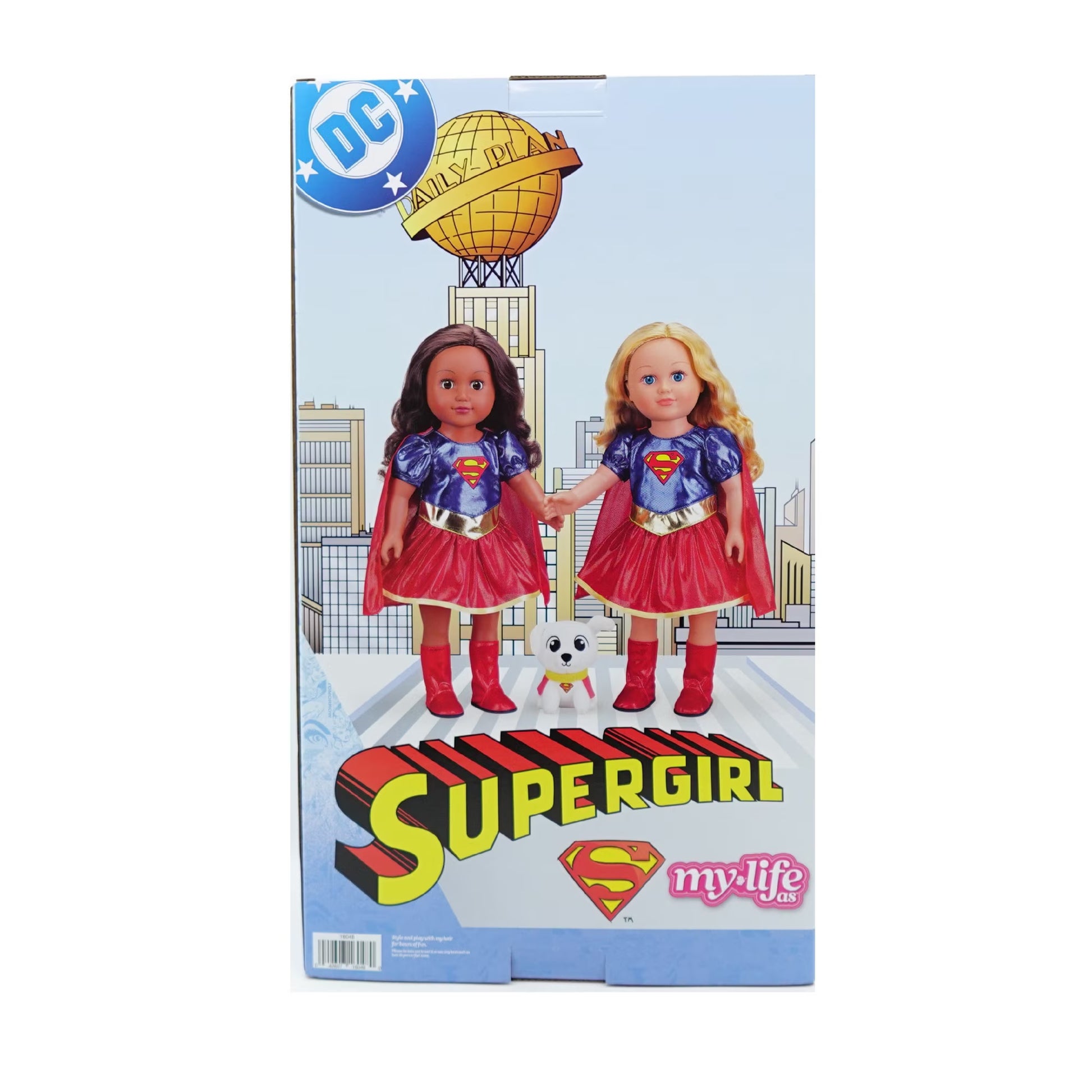 DC Comics 'My Life As A Supergirl' doll set in its original retail packaging, featuring two dolls dressed as Supergirl with a small white dog on the box art.
