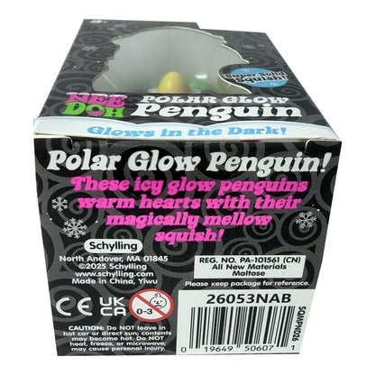 Schylling brand 'Polar Glow Penguin' toy packaging box, showing the back panel with product details, barcode, and safety information.