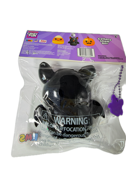A 2M1 brand 'Crazy Fun' black cat collectible toy in its original clear plastic packaging with a purple header card. The toy is a glossy black cat figure with a purple ball chain and purple paw-shaped tag.