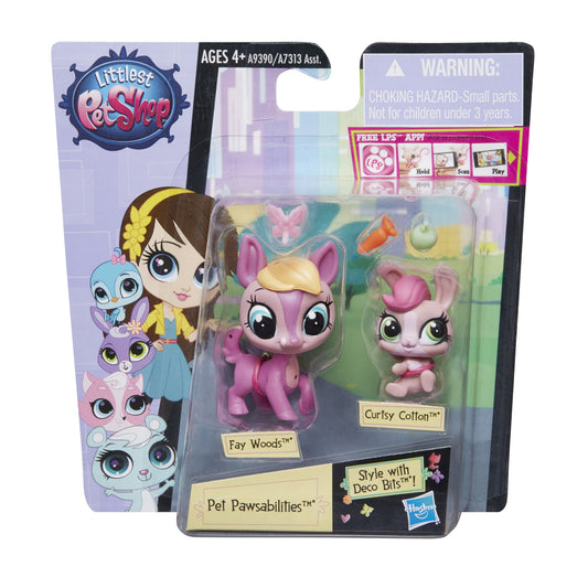 Littlest Pet Shop toy figures in packaging with branding and warning label.