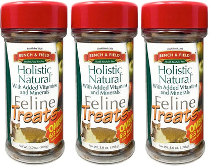 Three bottles of Bench & Field Holistic Natural Feline Treats with red lids.