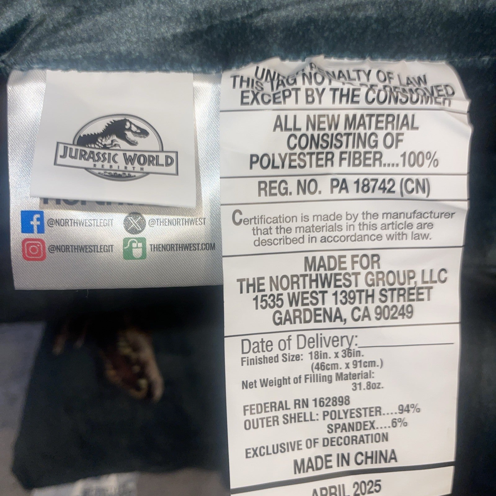 Jurassic World product label with branding and text details on a dark background