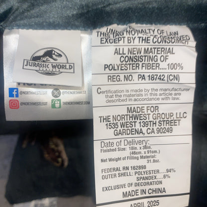 Jurassic World product label with branding and text details on a dark background