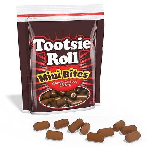 Packaging of Tootsie Roll Mini Bites with some candies displayed in front on a white background.