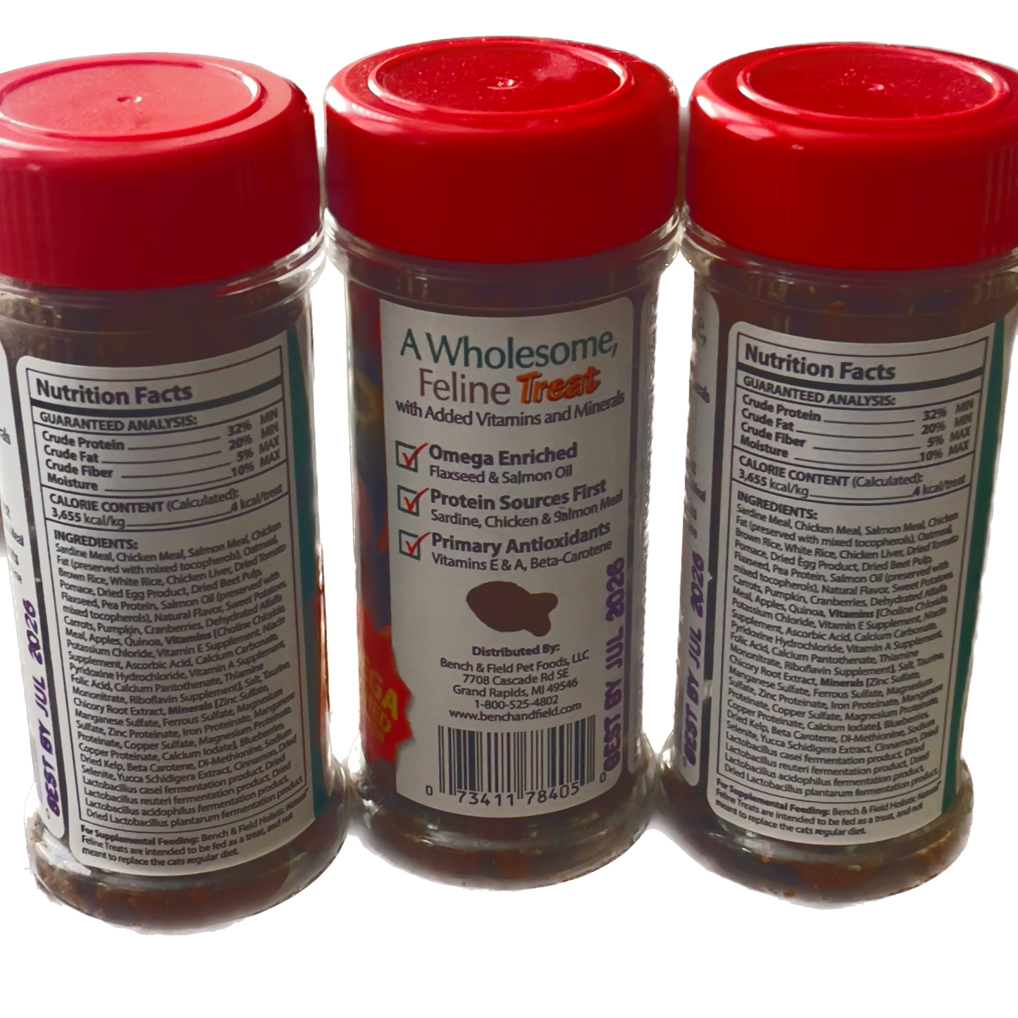 Three jars of a wholesome feline treat with red lids on a white background