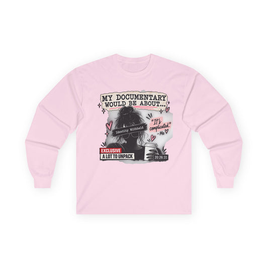 A light pink long-sleeve t-shirt with a graphic print on the front, featuring a black-and-white illustration of a woman and text that reads 'MY DOCUMENTARY WOULD BE ABOUT.