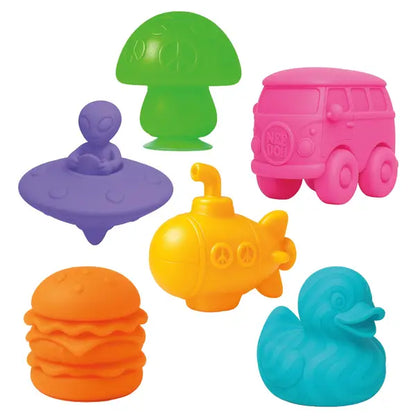 Set of colorful bath toys including a mushroom, van, alien, submarine, hamburger, and duck on a white background.