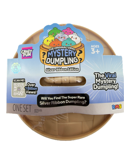 A packaged toy product labeled 'The Viral Mystery Dumpling!' with a blue and white paper sleeve and a beige plastic dumpling visible through a clear window. The package includes branding such as 'Crazy Pets' and 'The Original Witty Mystery Dumpling!' with a 'One Set' label.
