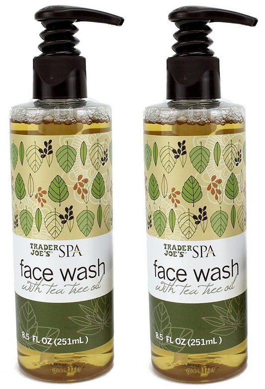 Two bottles of Trader Joe's Spa face wash with tea tree oil on a white background