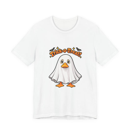 A white short-sleeve crewneck t-shirt featuring a cartoon graphic of a ghostly duck with orange beak and feet, under the text 'Trick or Treat!' in orange with small black bats.
