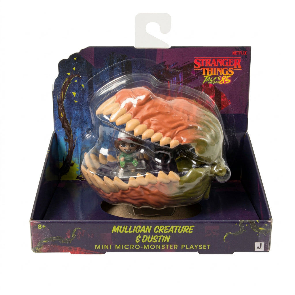 Stranger Things mini micro-monster playset containing the Mulligan Creature and Dustin the mini figure, packaged in its original box with a clear plastic blister pack.