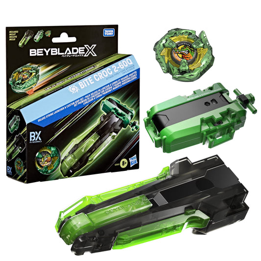 Beyblade X toy set with packaging, including a green Beyblade and launcher on a white background.