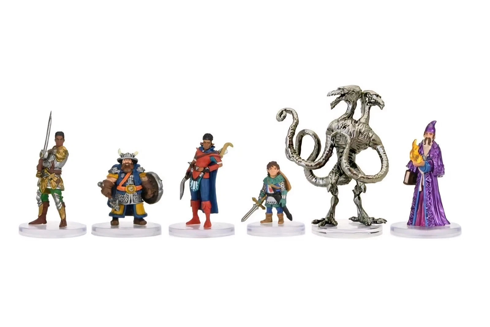 Set of miniature figurines including warriors and a dragon on a white background