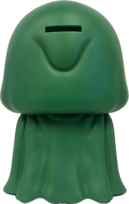 Green character-shaped money box with a plain background