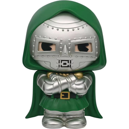 Toy figure with green cape and silver armor on a white background