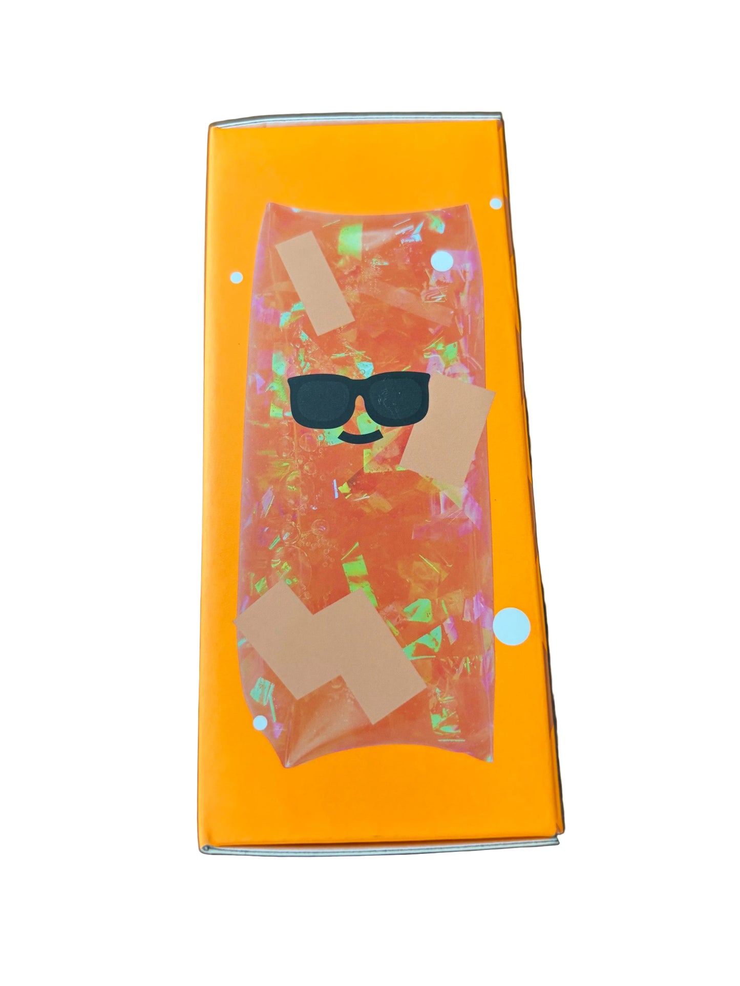 Orange box with a clear window showing sunglasses and a pair of socks on a textured surface