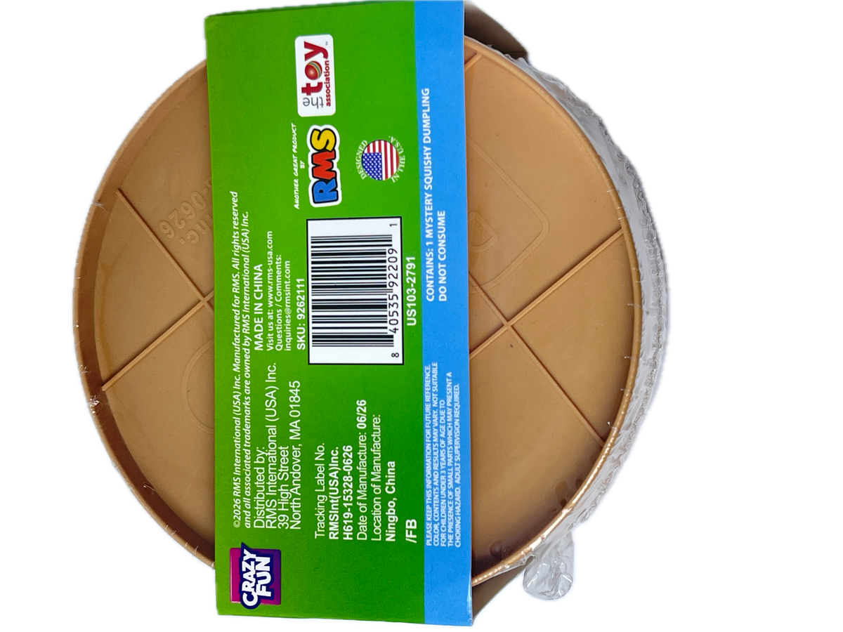 A round plastic toy piece in a tan/light brown color, wrapped in clear plastic and covered with a bright green product label featuring a barcode and text. The Crazy Fun brand logo is visible at the bottom left of the label.