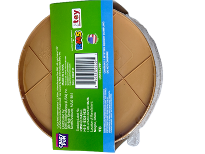 A round plastic toy piece in a tan/light brown color, wrapped in clear plastic and covered with a bright green product label featuring a barcode and text. The Crazy Fun brand logo is visible at the bottom left of the label.