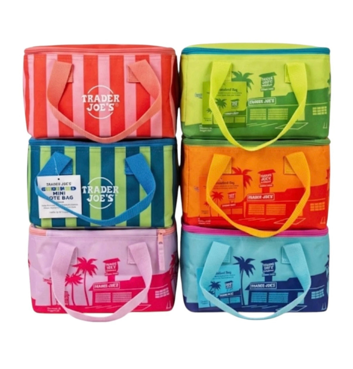 Stack of colorful tote bags with 'Trader Joe's' branding on a white background