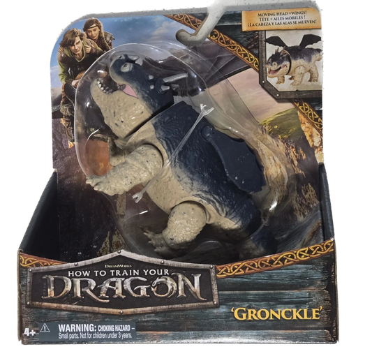 Gronckle toy figure in packaging with 'How to Train Your Dragon' branding
