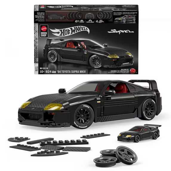 Hot Wheels '94 Toyota Supra MKIV building set with packaging and components on a white background