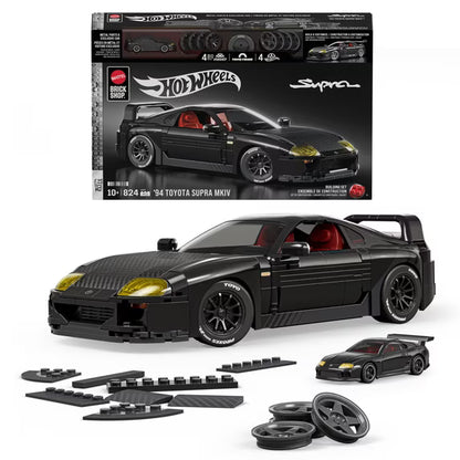 Hot Wheels '94 Toyota Supra MKIV building set with packaging and components on a white background