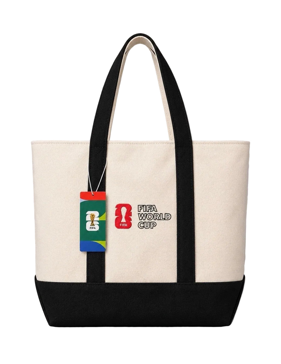 White tote bag with black handles and bottom, featuring FIFA World Cup logo, on gray background