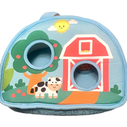 Children's backpack with farm-themed design featuring a barn, cow, and tree.