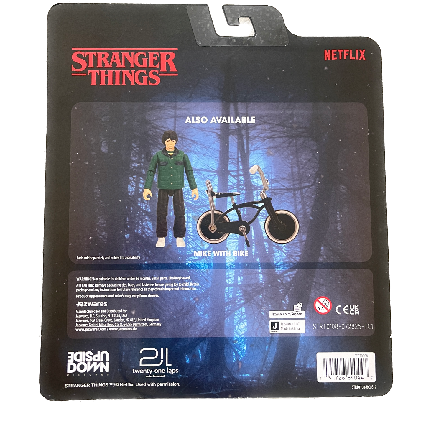 Stranger Things action figure packaging with bike, on a white background