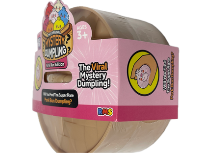 A packaged toy product labeled 'Original Mystery Dumpling Pork Bun Edition' with a pink cardboard wrap around a round beige dumpling. The packaging includes text such as 'The Viral Mystery Dumpling!' and a visible RMS logo, photographed on a plain white background.