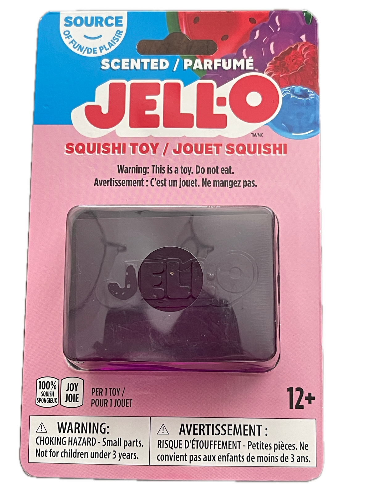 Jell-O Squishi Toy in its original pink and blue cardboard packaging, featuring a translucent purple square squishy toy inside a clear plastic window.