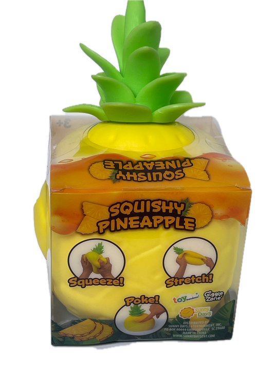 A packaged squishy pineapple toy with a bright yellow body, green leafy top, and printed packaging showing squeeze and poke instructions, isolated on a white background.