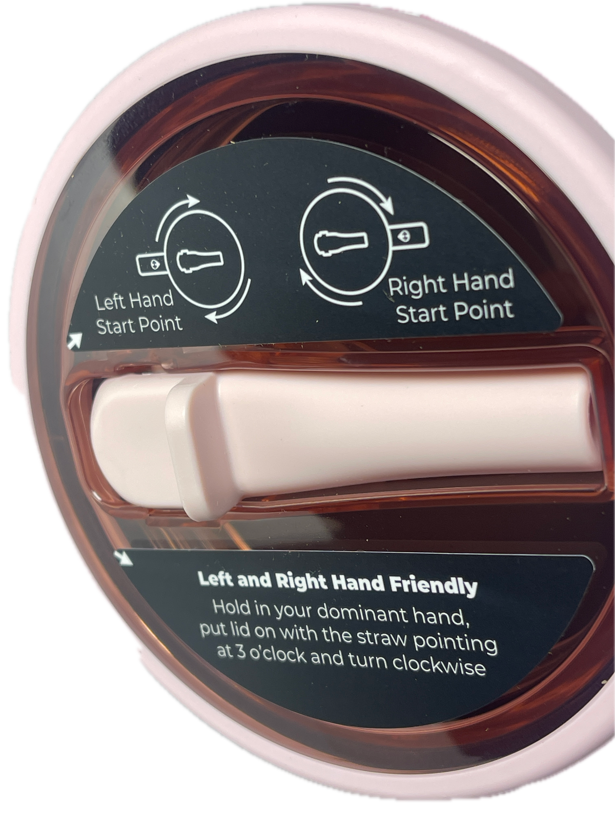 Close-up of a circular plastic bottle cap with a translucent amber-brown interior, a white central pull tab, and printed instruction labels showing how to open it with the dominant and left hand.