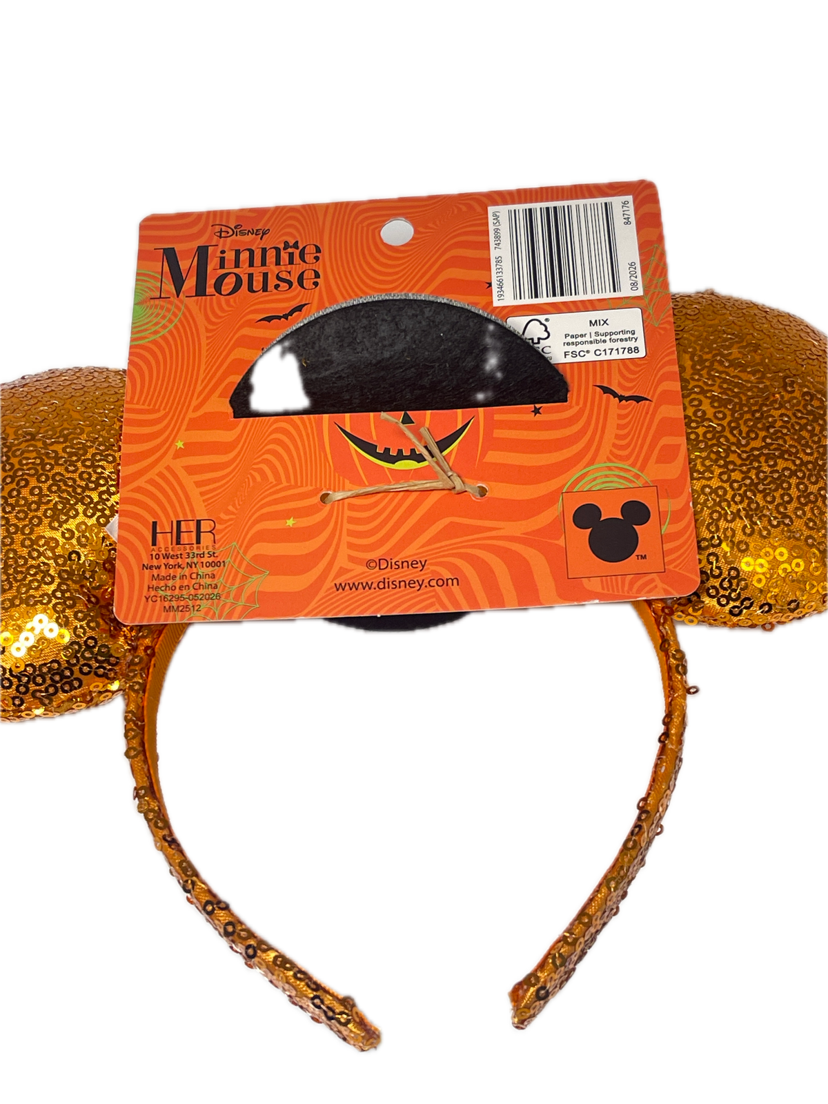 Disney Minnie Mouse Halloween headband with gold glitter ears and a black Mickey-shaped moon topper, attached to an orange retail card.