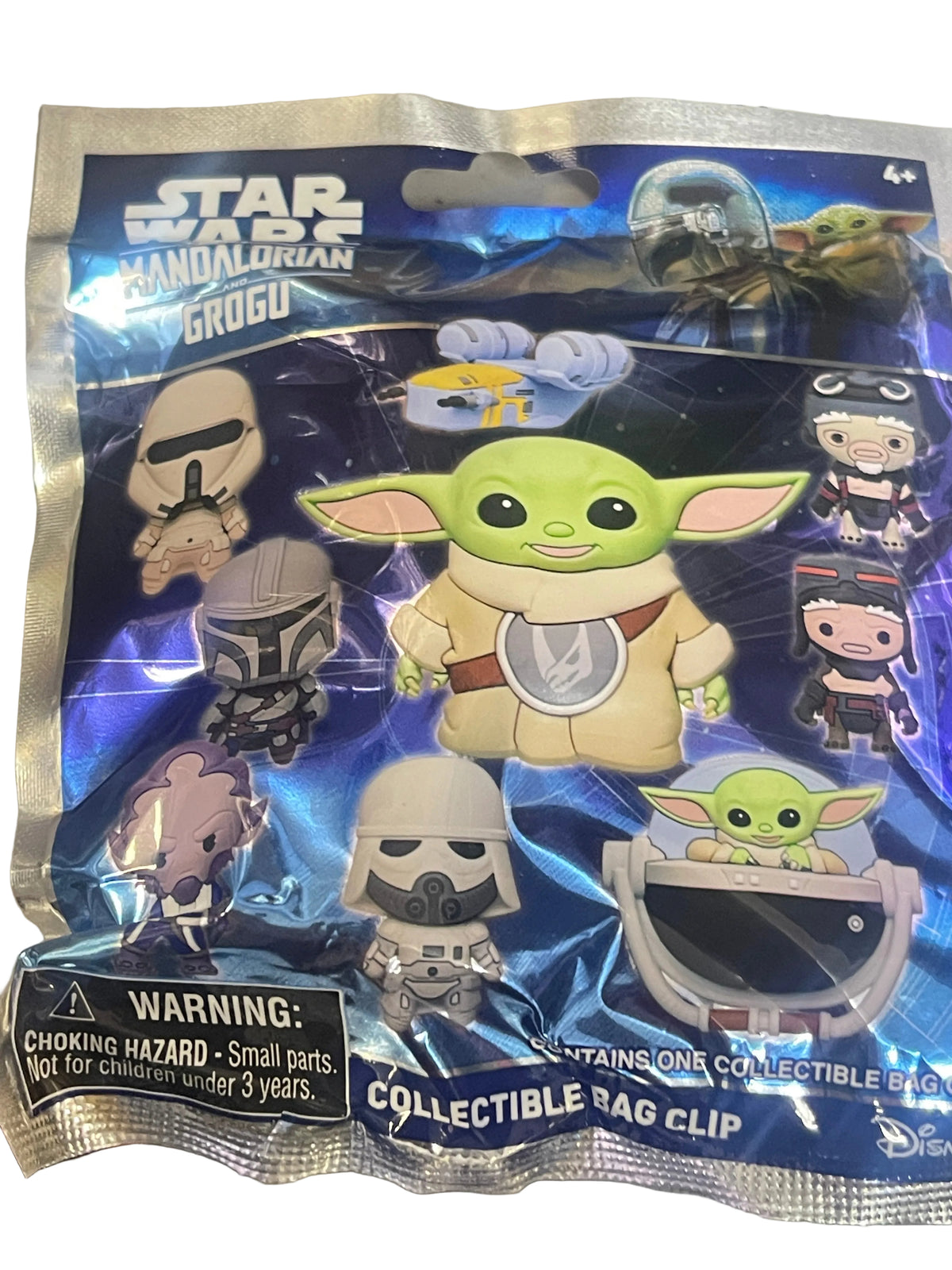 Star Wars The Mandalorian Grogu collectible bag clip in its original packaging, featuring a blue and silver foil bag with illustrations of Grogu and other characters.