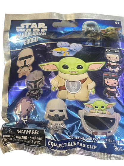 Star Wars The Mandalorian Grogu collectible bag clip in its original packaging, featuring a blue and silver foil bag with illustrations of Grogu and other characters.