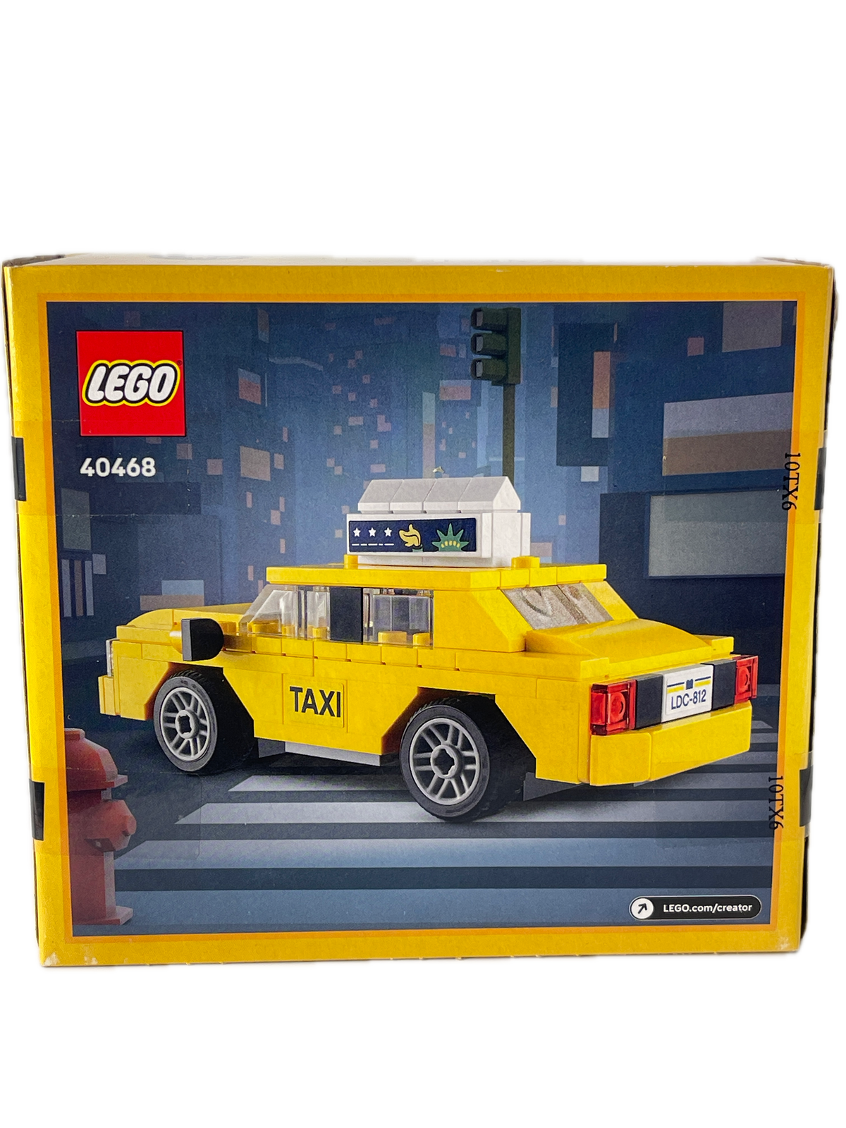 LEGO City Taxi set 40468 in its original yellow and blue packaging box, showing the assembled yellow taxi on the front.
