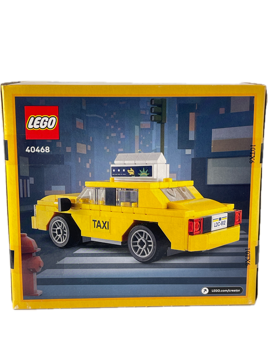 LEGO City Taxi set 40468 in its original yellow and blue packaging box, showing the assembled yellow taxi on the front.