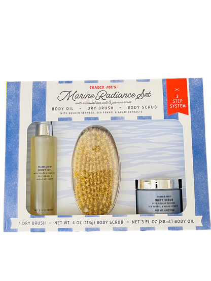 Trader Joe's Marine Radiance Set packaging with dry brush, body scrub, and body oil on a white background.