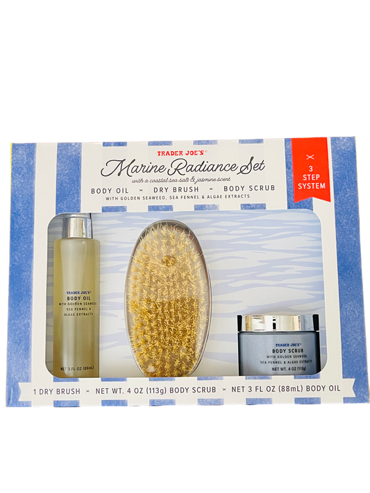 Trader Joe's Marine Radiance Set packaging with dry brush, body scrub, and body oil on a white background.