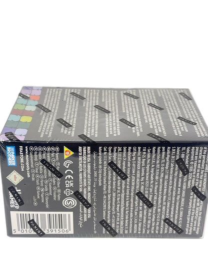 The back of a sealed Pokémon Trading Card Game booster box, showing dense white text, barcodes, and multiple black 'MADE IN USA' stickers on a light gray background.