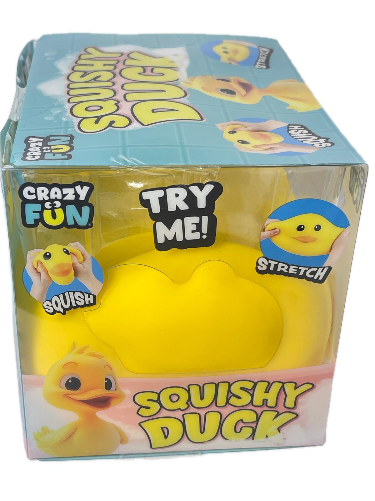 A yellow rubbery squishy duck toy in clear retail packaging with printed graphics and text including 'SQUISHY DUCK' and 'TRY ME!'.