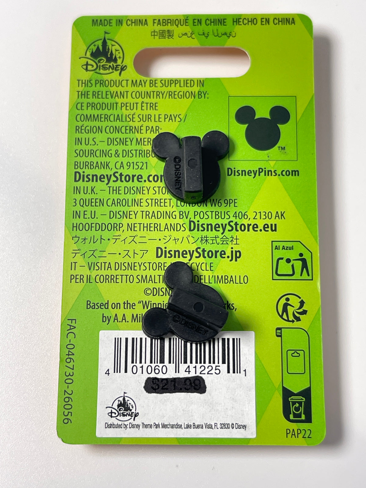 Black Mickey Mouse ear hooks on a green Disney retail backing card with printed text, barcode, and Mickey silhouette.
