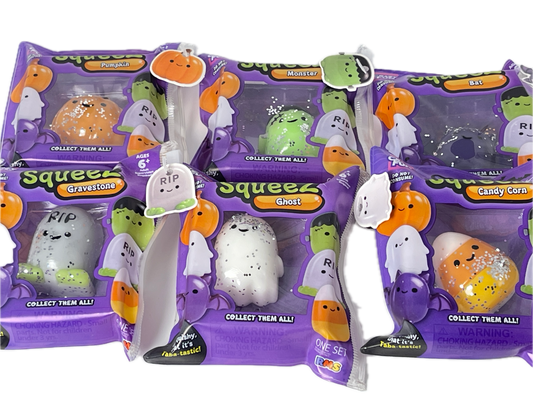 Six packages of Squeez Ghost collectible squishy toys in Halloween-themed purple packaging, featuring different ghost designs like pumpkin, gravestone, candy corn, and RIP.