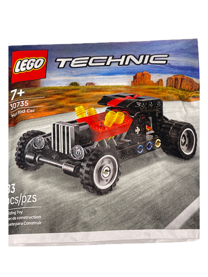 LEGO Technic Hyped Car box art showing a black and gray toy car with red and yellow accents, set against a desert canyon backdrop on a gray road.