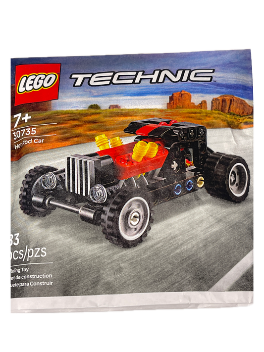 LEGO Technic Hyped Car box art showing a black and gray toy car with red and yellow accents, set against a desert canyon backdrop on a gray road.